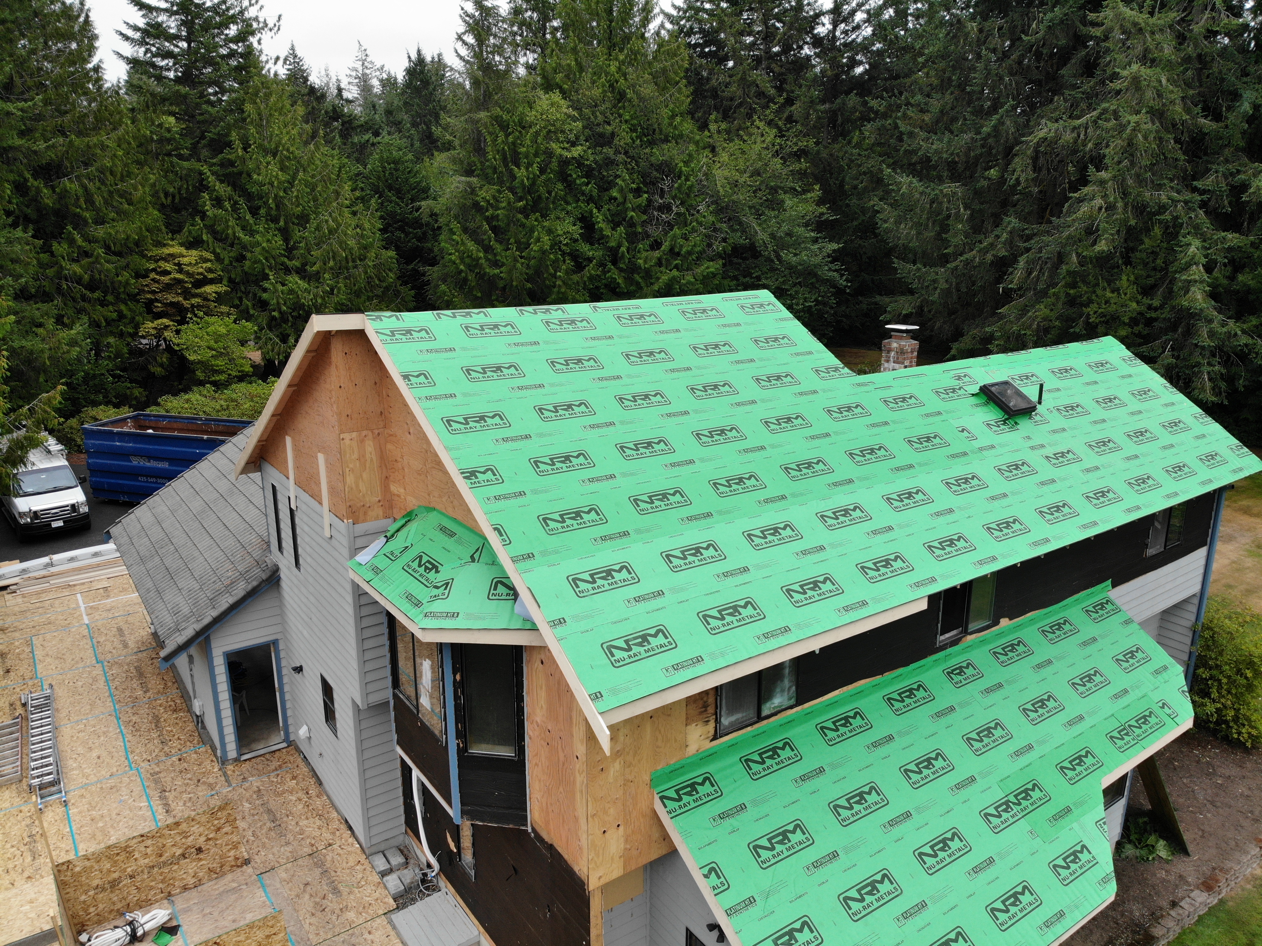 Roof underlayment and moisture barrier installation