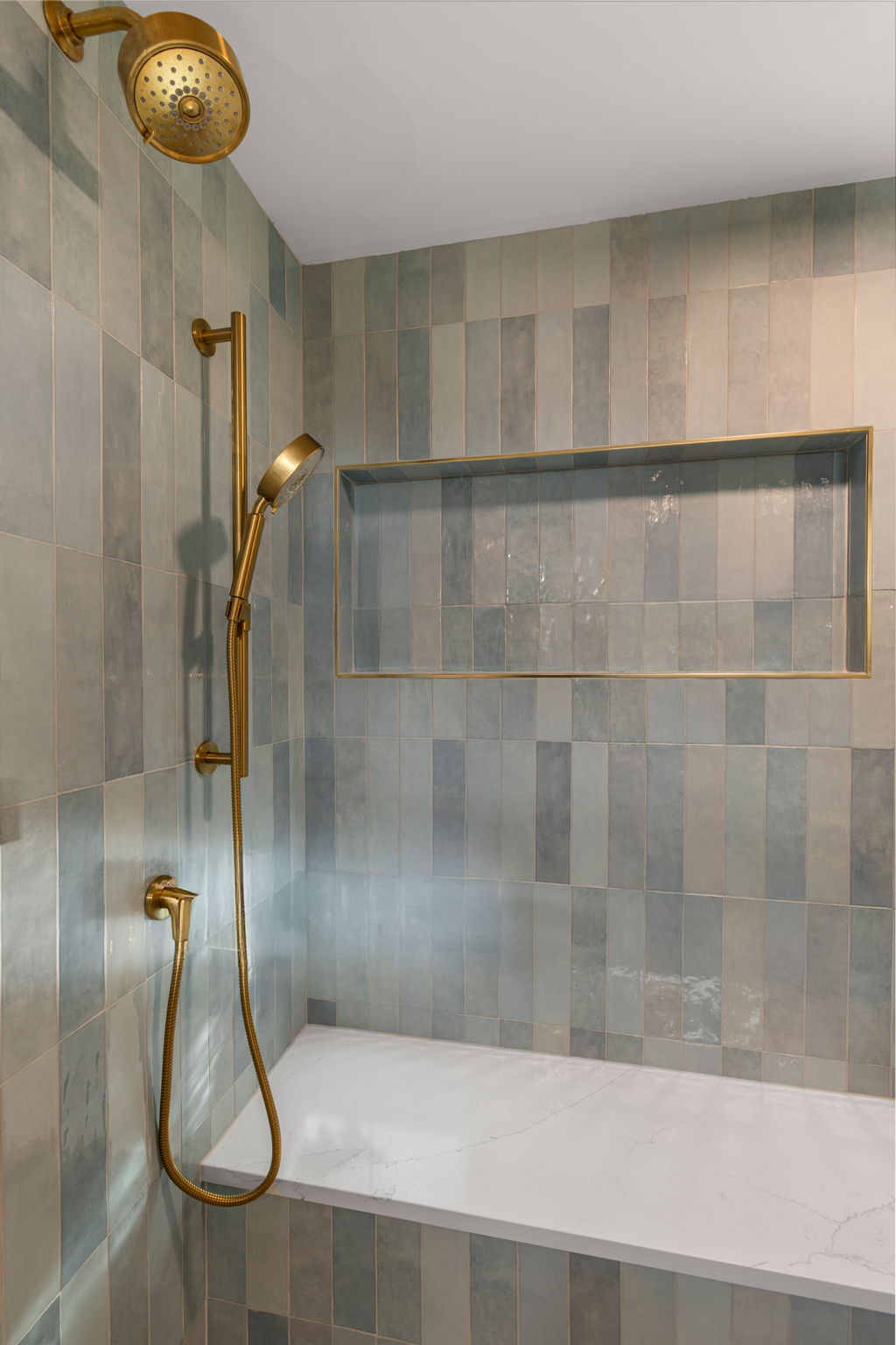 Custom tile shower with brass fixtures